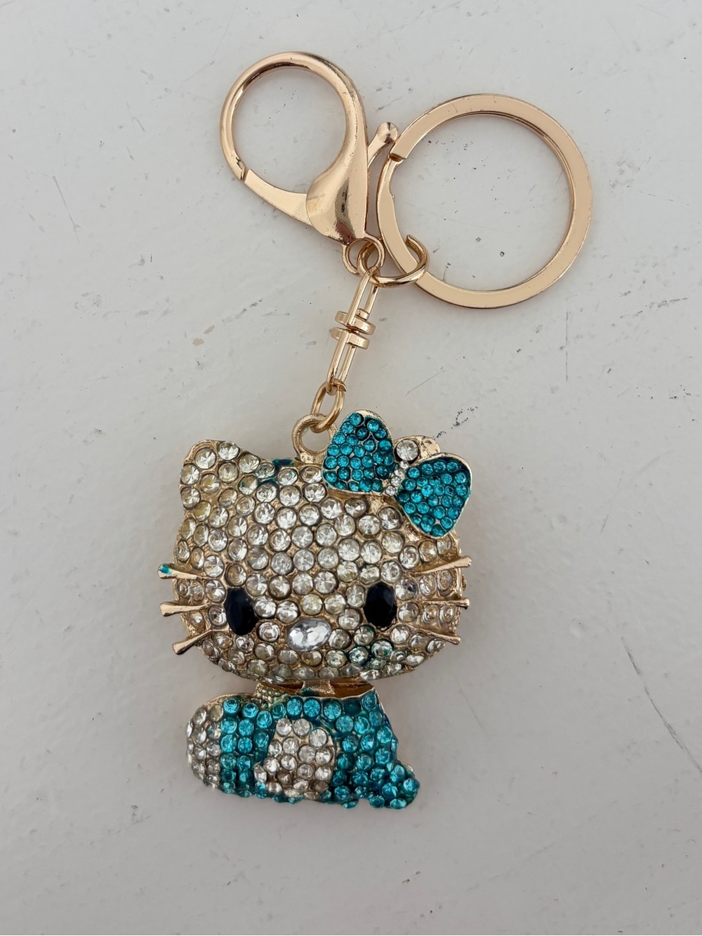 Hello Kitty Sparkle Keychain - Gold Tone with Teal and Clear Crystals